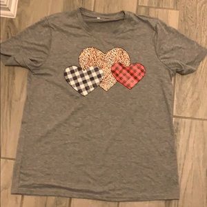 Cute heart t shirt. Never worn no tags.